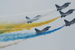 Members of the 'August 1st' Aerobatic Team perform during the 13th China International Aviation and Aerospace Exhibition, Zhuhai, Sept. 29, 2021.