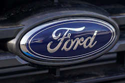 This April 25, 2021 photo shows the blue oval logo of Ford Motor Company in east Denver. Ford say, Thursday, Sept. 9, it’s going to stop making vehicles for sale in India immediately as part of its efforts to return its business there to profitability, resulting in the loss of approximately 4,000 jobs.