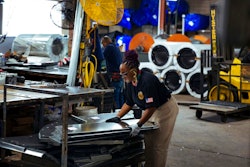 Sheet metal worker Carey Mercer assembles ductwork at Contractors Sheet Metal on Tuesday, Aug. 3, 2021, in New York. The construction industry is fighting to recruit more women into a sector that faces chronic labor shortages. As spending on infrastructure rises, construction firms will need to hire at least 430,000 new skilled laborers in 2021, according to an analysis of federal data by the Associated Builders and Contractors. Right now, only 4% of construction laborers in the U.S. are women, according to the Bureau of Labor Statistics