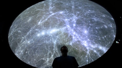 Hadrien Gurnel, software engineer EPFL's Laboratory for Experimental Museology (eM+), explores a map of the universe with the virtual reality software VIRUP, St-Sulpice, Switzerland, Oct. 12, 2021.