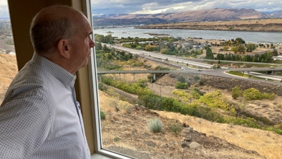Mayor Richard Mays looks at the Columbia River from his hilltop home, The Dalles, Ore., Oct. 5, 2021.