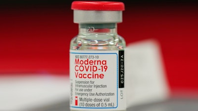 A vial of the Moderna COVID-19 vaccine at a hospital in Denver, Dec. 23, 2020.