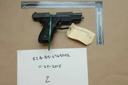 Evidence photo of an M11 semiautomatic handgun, Nov. 15, 2015, Suffolk, Mass.