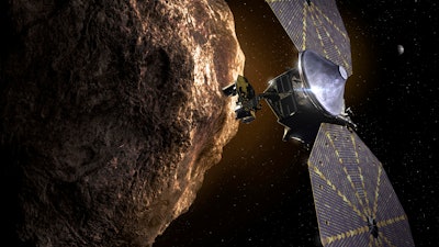 Image depicting the Lucy spacecraft approaching an asteroid.
