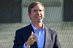 Kentucky Gov. Andy Beshear speaks during the official announcement of Ford Motor Company along with SK Innovations in building two electric battery factories in Glendale, Ky., at the Kentucky State Capitol in Frankfort, Ky., Tuesday, Sept. 28, 2021.