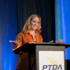 Pamela Kan giving her acceptance speech after receiving the Warren Pike Award at PTDA's 2021 Industry Summit on Oct. 22 in Atlanta, GA.