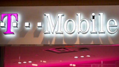 T-Mobile sign at a shopping mall, Pittsburgh, Feb. 24, 2021.