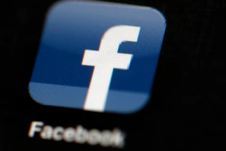 Facebook logo on an iPad in Philadelphia, May 16, 2012.