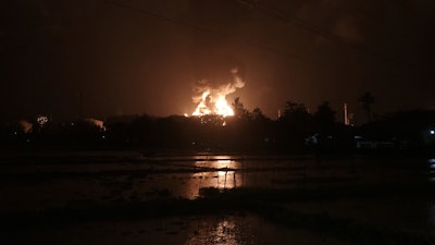 Fire at a Pertamina oil refinery, Cilacap, Indonesia, Nov. 13, 2021.