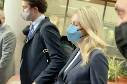 In this image take from video, Elizabeth Holmes leaves the U.S. Federal Courthouse in San Jose, Calif., Nov. 19, 2021.
