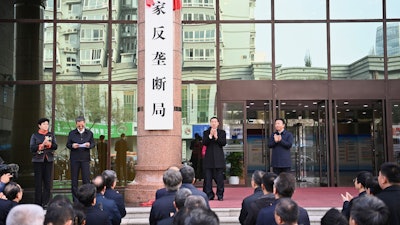 Wang Yong, Chinese state councilor and director of the Anti-Monopoly Commission of the State Council, attends the inauguration of the National Anti-Monopoly Bureau in Beijing, Nov. 18, 2021.