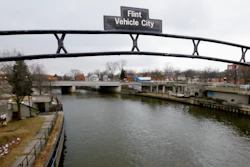 This Jan. 26, 2016, file photo, shows the Flint River in Flint, Mich. A judge on Wednesday, Nov. 10, 2021, approved a $626 million settlement for Flint residents and others who were exposed to lead-contaminated water.