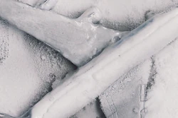 Model airplane experiencing cold conditions with and without coating.