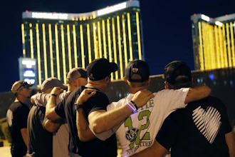 Survivors return to the scene of a mass shooting on its first anniversary in Las Vegas, Oct. 1, 2018.