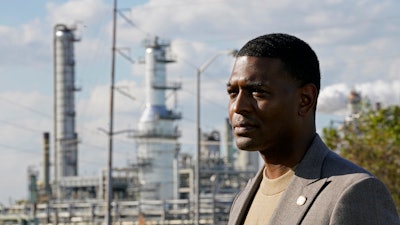 EPA Administrator Michael Regan stands near the Marathon Petroleum Refinery, Reserve, La., Nov. 16, 2021.