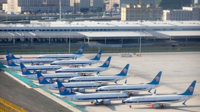 China Southern Airlines Boeing 737 Max airplanes parked at Urumqi Diwopu Interational Airport, April 21, 2021.