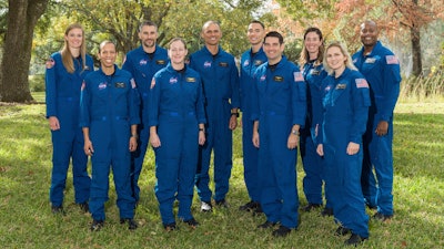 NASA's 2021 astronaut candidate class, announced Dec. 6, 2021. From left, U.S. Air Force Maj. Nichole Ayers; Christopher Williams; U.S. Marine Corps Maj. (retired) Luke Delaney; U.S. Navy Lt. Cmdr. Jessica Wittner; U.S. Air Force Lt. Col. Anil Menon; U.S. Air Force Maj. Marcos Berríos; U.S. Navy Cmdr. Jack Hathaway; Christina Birch; U.S. Navy Lt. Deniz Burnham; Andre Douglas.