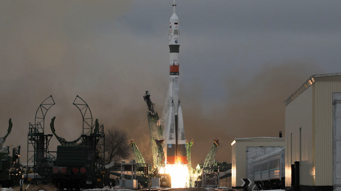 The Soyuz-2.1a rocket booster blasts off at the Baikonur cosmodrome, Kazakhstan, Dec. 8, 2021