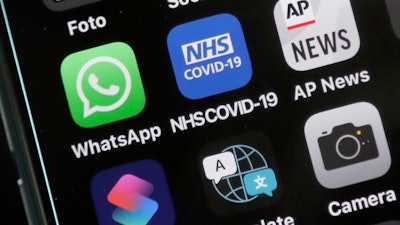 An iPhone with the NHS COVID-19 mobile app in London, Sept. 24, 2020.