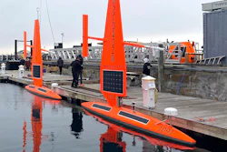 A Saildrone Explorer ocean drone is prepared for launch, Newport, R.I., Dec. 8, 2021.