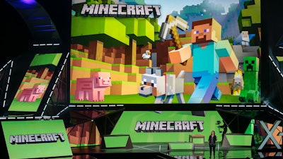 Lydia Winters shows off Microsoft's 'Minecraft' for HoloLens at the Xbox E3 2015 briefing before Electronic Entertainment Expo, Los Angeles, June 15, 2015.