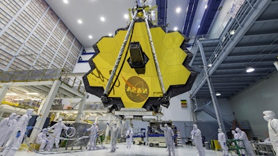 Technicians lift the mirror of the James Webb Space Telescope using a crane at the Goddard Space Flight Center in Greenbelt, Md., April 13, 2017.