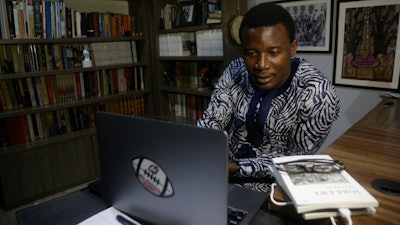 Kola Tubosun in his house in Lagos, Nigeria, Nov. 24, 2021.