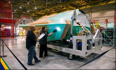 The manual inspection process of the F-35 introduces variables and also puts workers at risk as they attempt to straddle the smooth contoured surfaces of the aircraft.