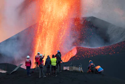 Scientists from CSIC (Spanish National Research Council) take geophysics measurements on the Canary Island of La Palma, Spain, Saturday, Nov. 13, 2021. They come with eagle-eyed drones and high-precision spectrometers. Aided by satellites, they analyze gas emissions and the extent and direction of molten rock flows.