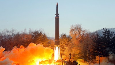 Photo provided by the North Korean government shows what it says a test launch of a hypersonic missile, Jan. 5, 2022.