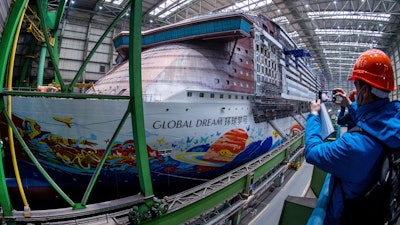 The cruise ship 'Global Dream' under construction in the shipbuilding hall of MV Werften shipyard, Wismar, Germany, Jan. 7, 2022.