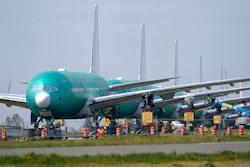 A line of Boeing 777X jets parked at Paine Field, Everett, Wash., April 23, 2021.