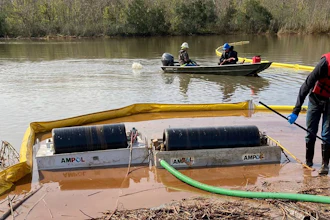 Cleanup work at the site where more than 300,000 gallons of diesel spilled outside New Orleans.