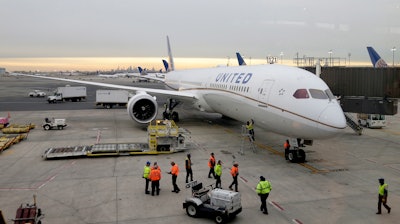 A Dreamliner 787-10 arriving from Los Angeles pulls up to a gate at Newark Liberty International Airport, Newark, N.J., Jan. 7, 2019.