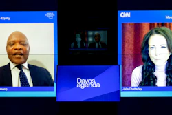 Screens show John Nkengasong, left, Director of the Africa Centres for Disease Control and Prevention (Africa CDC), and Moderator Julia Chatterley, right, during a remote panel titled 'The Challenge of Vaccine Equity', at the Davos Agenda 2022, in Cologny near Geneva, Switzerland, on Jan. 18, 2022.
