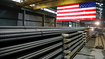 In this May 9, 2019 photo, steel rods produced at the Gerdau Ameristeel mill in St. Paul, Minn. await shipment.