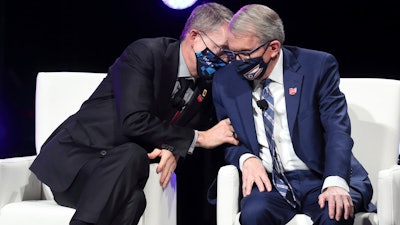 Intel CEO Patrick Gelsinger, left, talks with Ohio Gov. Mike DeWine at a news conference, Newark, Ohio, Jan. 21, 2022.