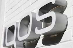 Store sign for the iQOS heated cigarette in Richmond, Va., Nov. 25, 2019.