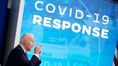 President Joe Biden speaks about the government's COVID-19 response, in the South Court Auditorium in the Eisenhower Executive Office Building on the White House Campus in Washington, Thursday, Jan. 13, 2022.