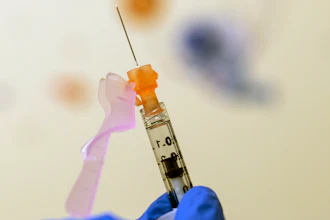 A nurse prepares a COVID-19 vaccine dose at Children's National Hospital in Washington, Nov. 3, 2021.