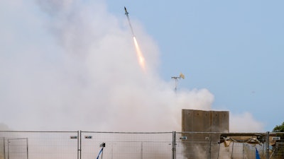 An Iron Dome air defense system mssile launches to intercept a rocket, Ashkelon, Israel, May 11, 2021.