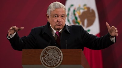 President Andres Manuel Lopez Obrador gives his daily morning news conference at the presidential palace, Mexico City, Dec. 18, 2020.