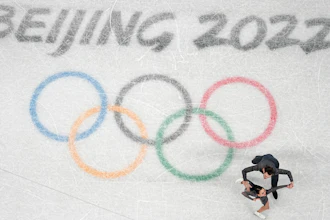 Karina Safina and Luka Berulava of Gerogia compete during the pairs short program figure skating competition at the 2022 Winter Olympics, Beijing, Feb. 4, 2022.