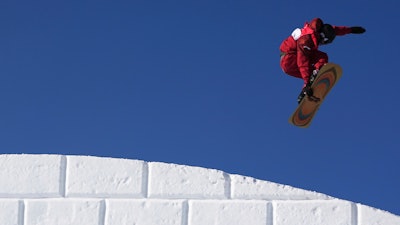 Canada's Darcy Sharpe competes during the men's slopestyle qualifying at the 2022 Winter Olympics, Feb. 6, 2022, Zhangjiakou, China.
