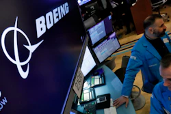 The Boeing logo above a trading post on the floor of the New York Stock Exchange, March 12, 2020.