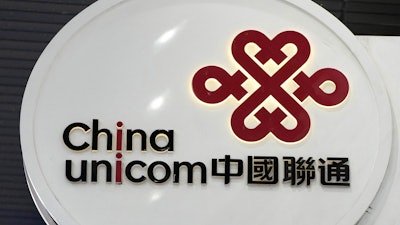 China Unicom Limited logo at a shop in Hong Kong, Nov. 18, 2021.