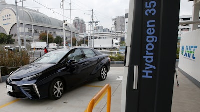 A Toyota Mirai hydrogen fuel cell vehicle at a hydrogen station in Tokyo, Nov. 17, 2014.