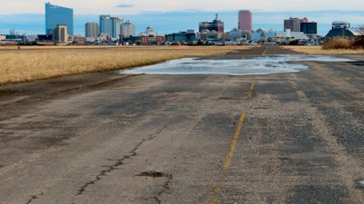 Pot-holed runway at the former Bader Field airport site in Atlantic City, N.J., Feb. 18, 2022.
