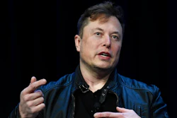 Tesla and SpaceX Chief Executive Officer Elon Musk speaks at the SATELLITE Conference and Exhibition in Washington, Monday, March 9, 2020. U.S. securities regulators responded to allegations that they are harassing Elon Musk, writing in a letter that they’re following a judge’s instructions in trying to speak with the Tesla CEO’s lawyers about his posts on Twitter. In a letter dated Friday, Feb. 18, 2022, Steven Buchholz of the Securities and Exchange Commission’s San Francisco Office, wrote that the judge handling a securities case against Musk encouraged both sides to confer before raising issues with the court.