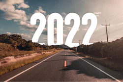 The Word 2022 Behind The Tree Of Empty Asphalt Road At Golden Sunset And Beautiful Blue Sky 1300086148 2125x1417 (1)